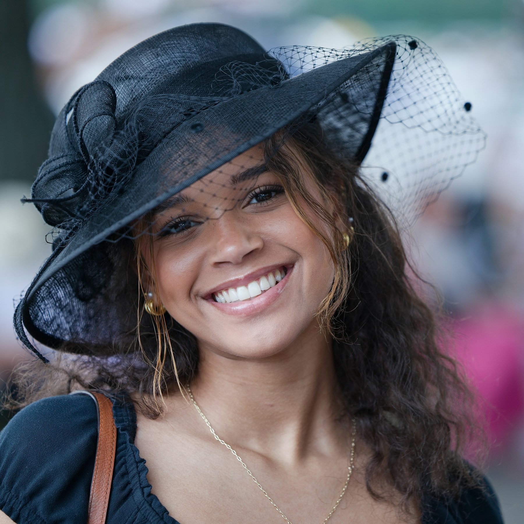 Guest in a black hat