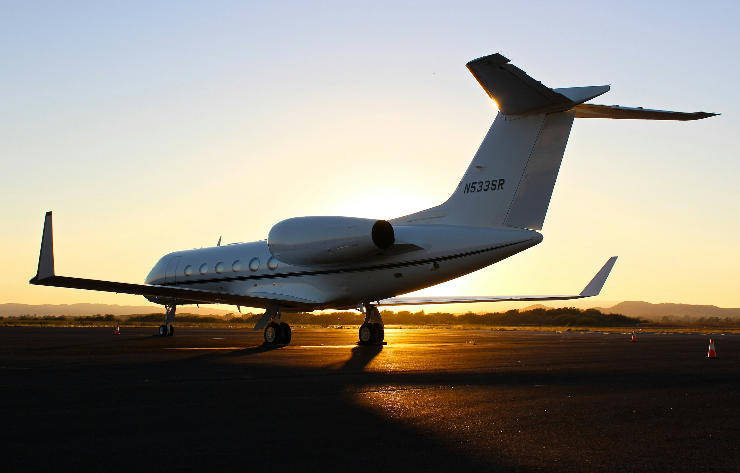 Private jet at sunset