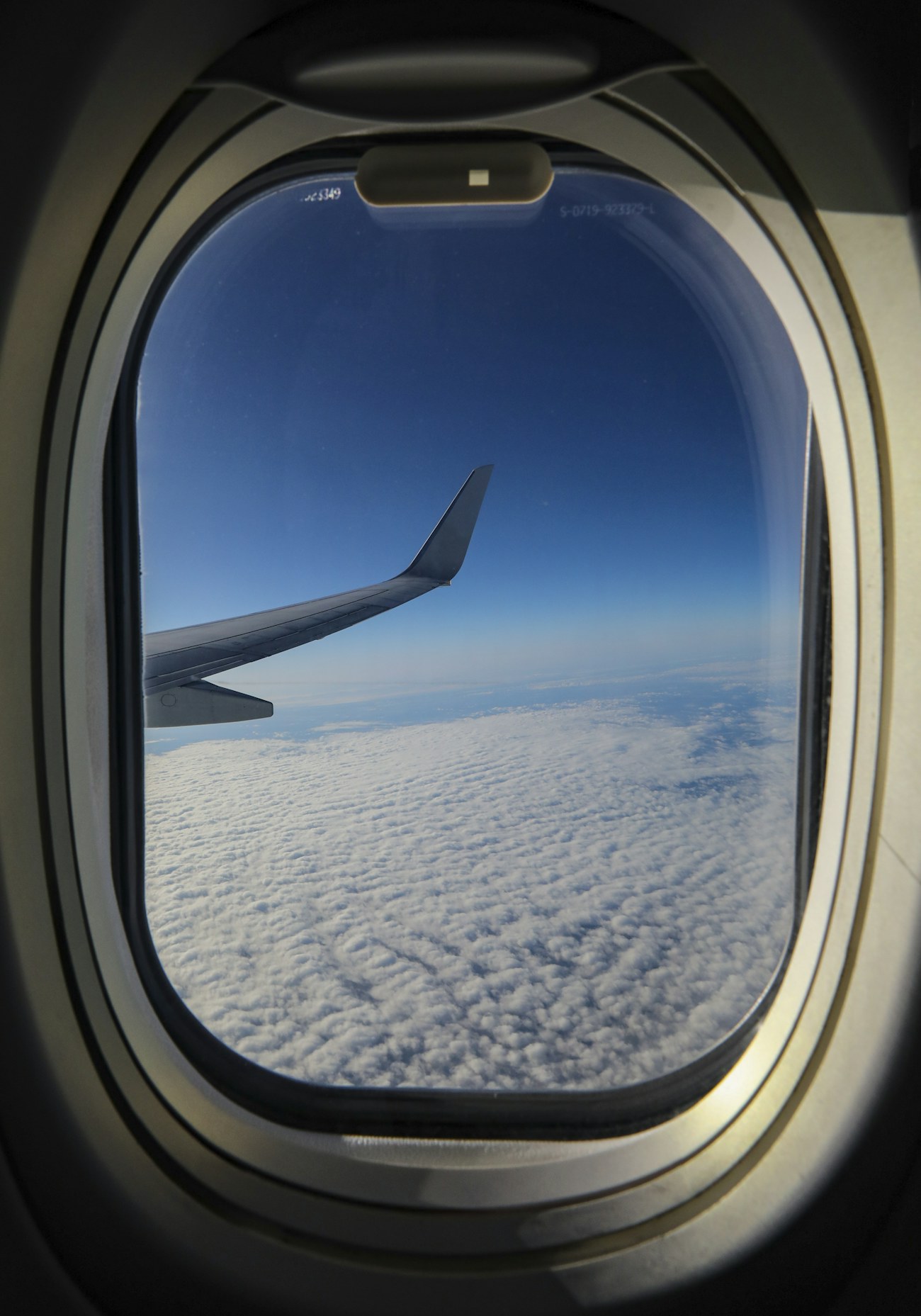 Window view above clouds