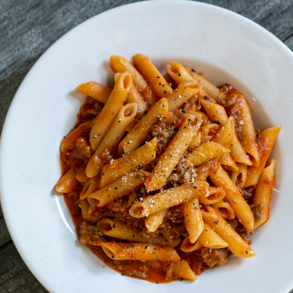 Bowl of penne in tomato sauce