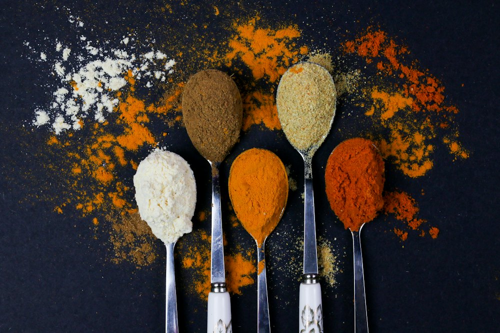 Spoons of ground spices