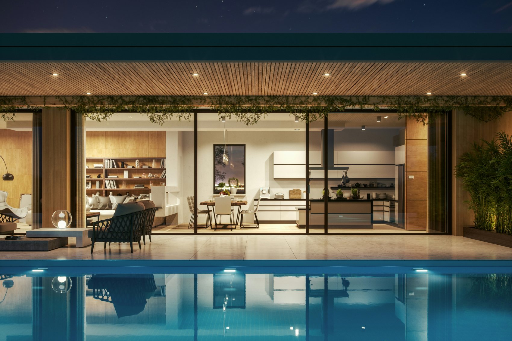 A modern villa with a pool at dusk