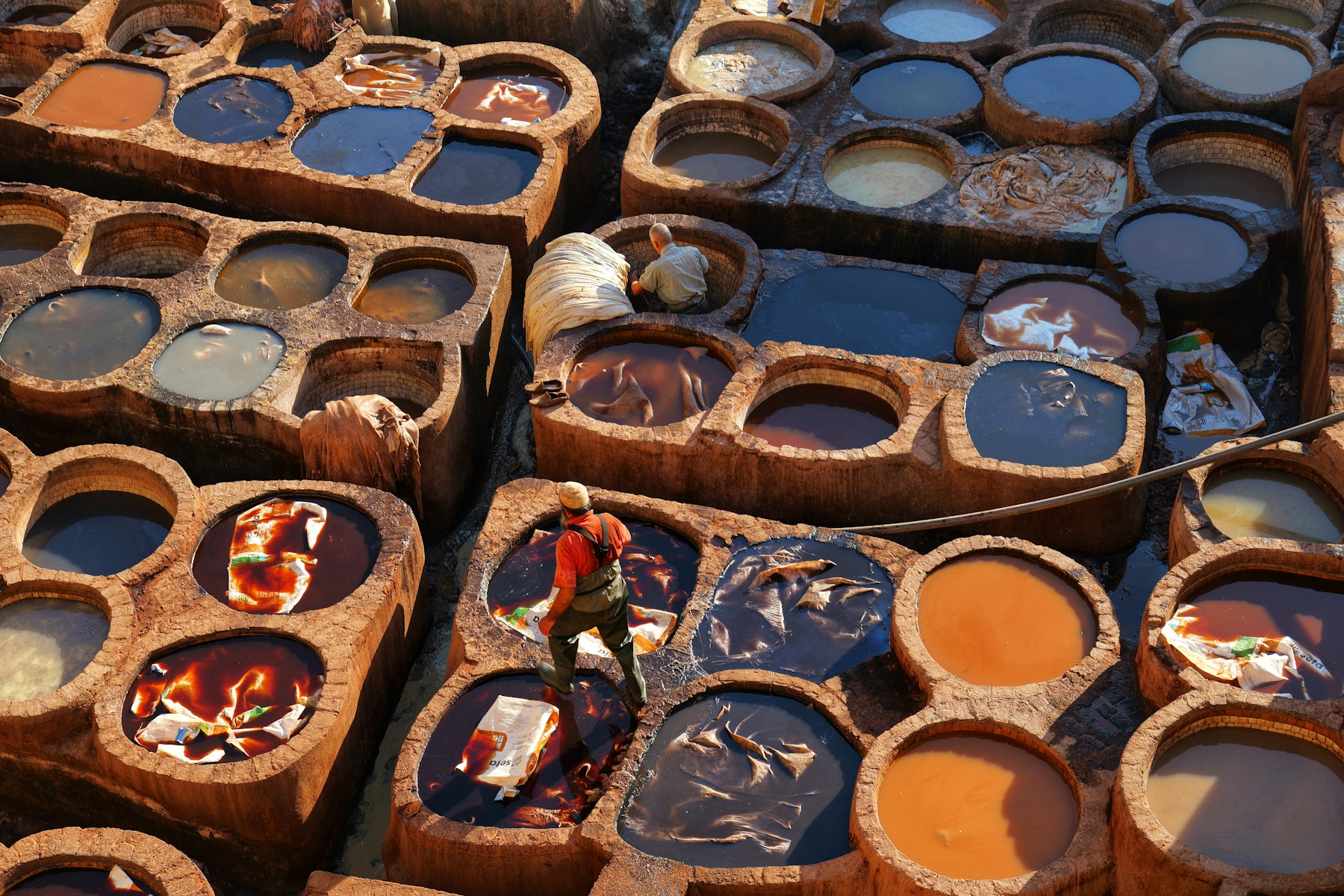 A tannery with dye pits from above